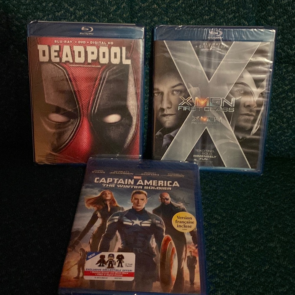 3 sealed blu-Ray movies. Dead Pool, Captain America and X-Men